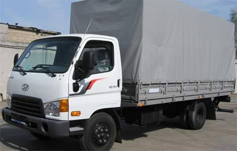 Бортовой грузовой автомобиль с тентом Hyundai HD65/78